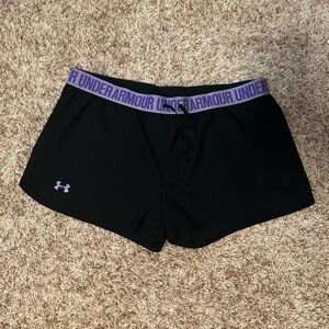 black under amour shorts with purple band
